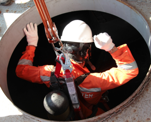 Scaffolding team working safely in confined spaces for industrial maintenance and access solutions