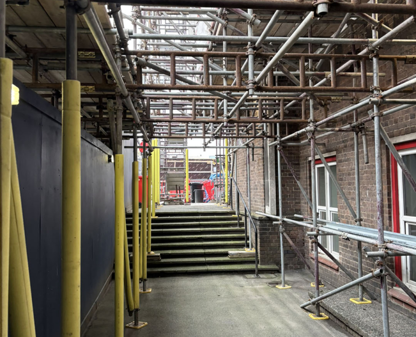 scaffolding design to Maintain building operations throughout the project